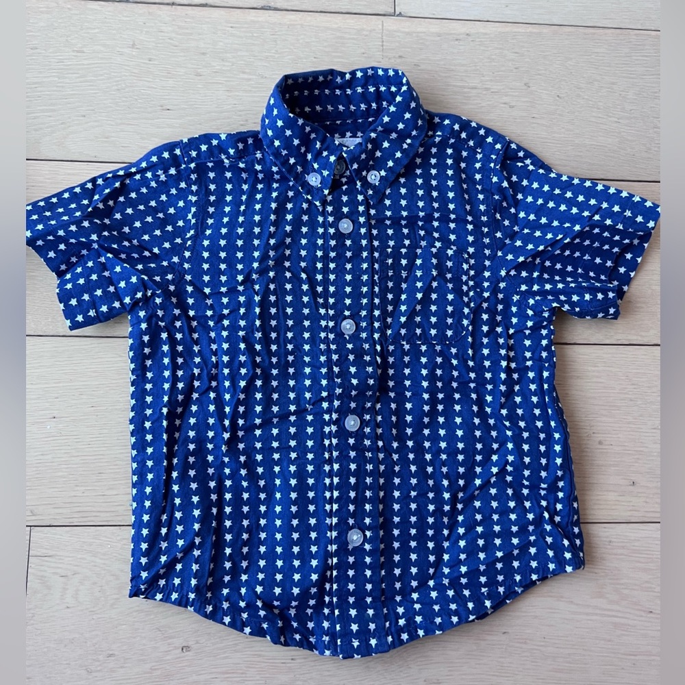 Patriotic Blue short sleeve button down shirt with white stars. Size boy 2T